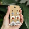 Silver Earrings With Crystal Moon And Sun Pendant For Women