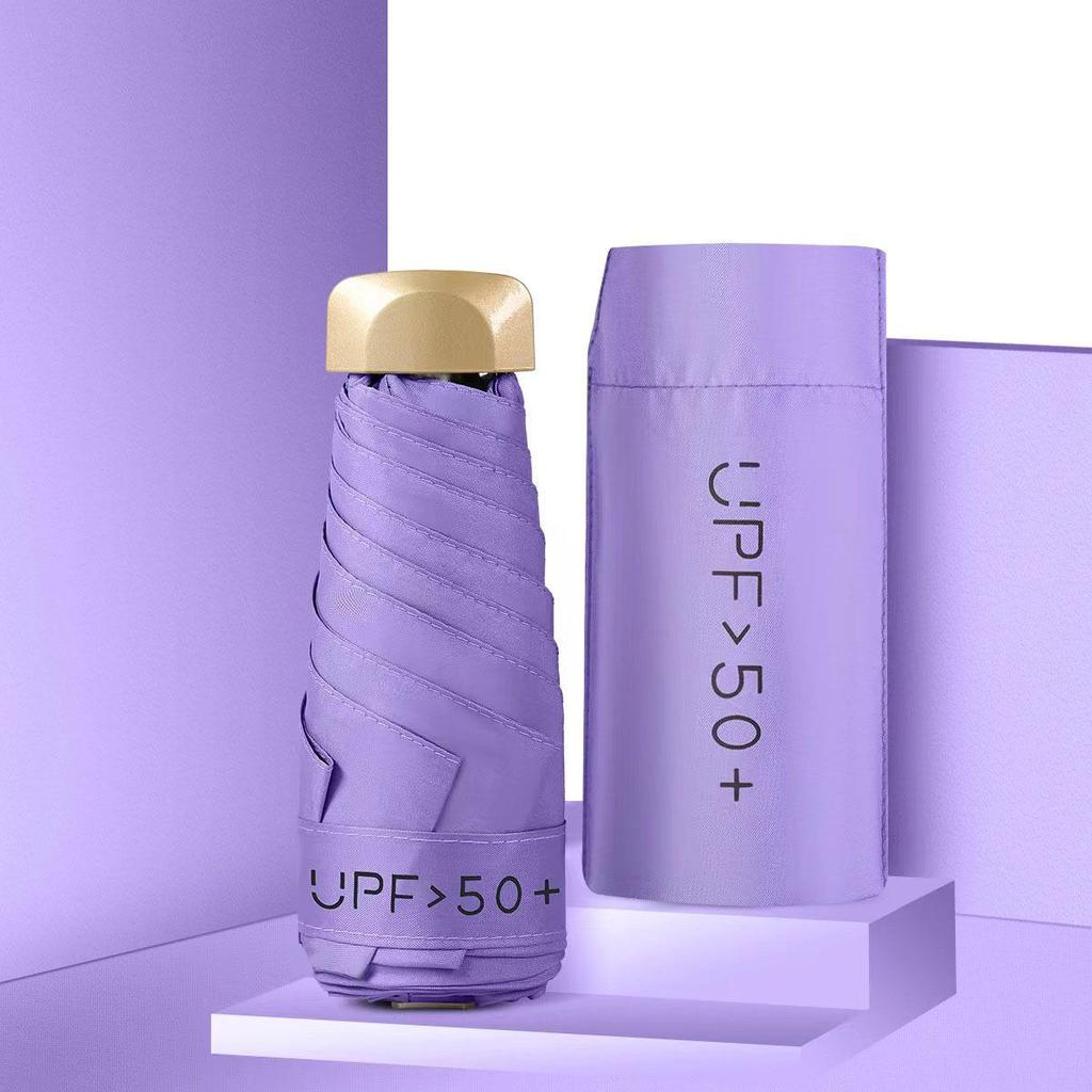 50 % rabatt på svart kapselparaply i lommeformat - Seks-skjerms sammenleggbar for sol og regn