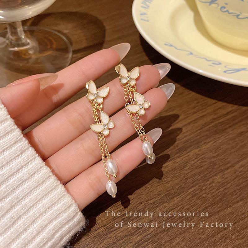 Super fairy butterfly pearl fringed earrings femininity versatile long stud earrings wholesale of the same earrings