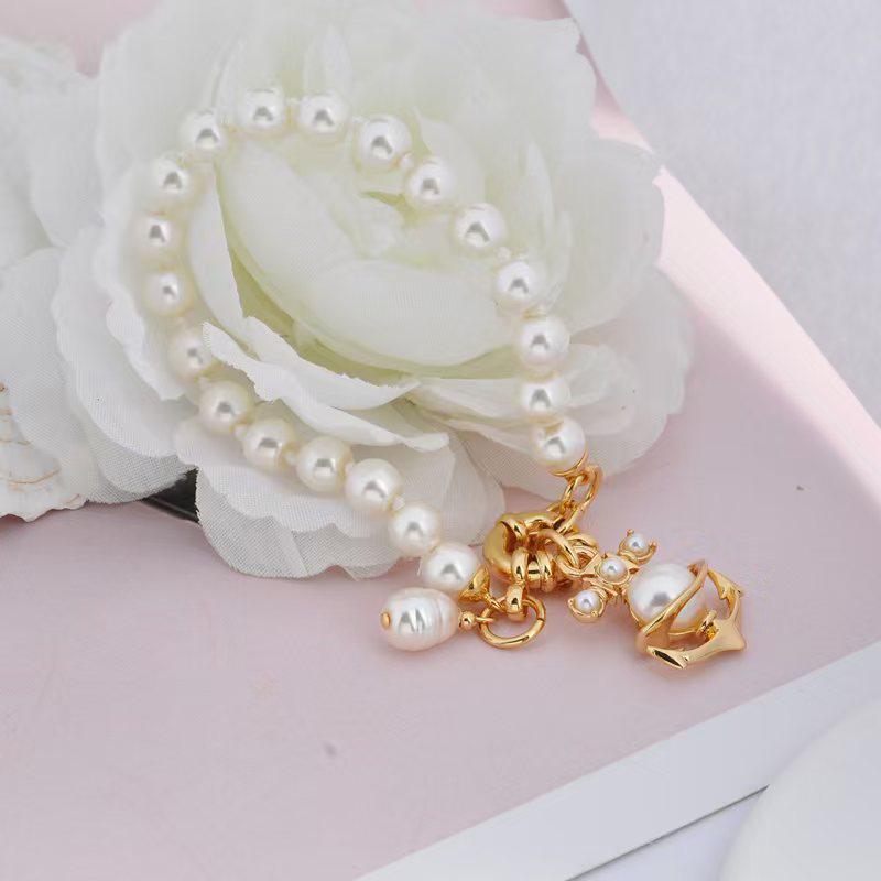 Empress Dowager Saturn Pearl Necklace, Bracelet, and Earrings Set: Light Luxury Punk Clavicle Chain for Women
