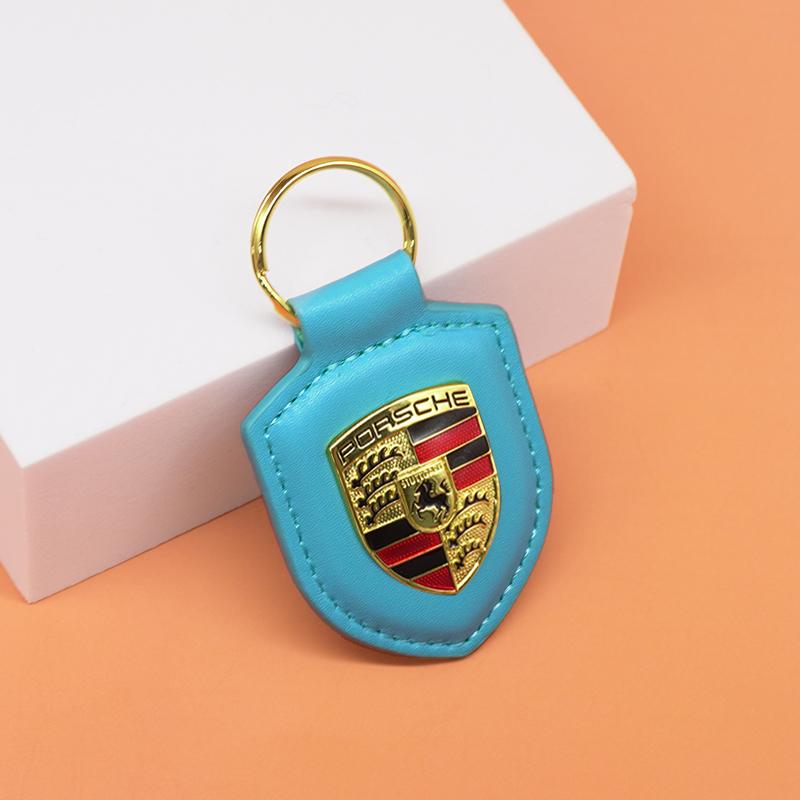 

Шкіряний брелок для ключів автомобіля Тип Щит 3D Емблема Кільце для ключів Для Porsche Panamera Cayenne Taycan 911 718 Macan Carrera-GT 928 944 968 944 синій
