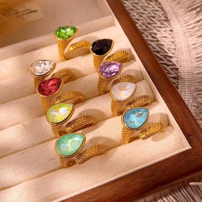 CARLIDANA High-End Fashion Luxury Geometric Gold Plated Open Stainless Steel Textured Colorful Waterdrop Zirconia Ring for Women