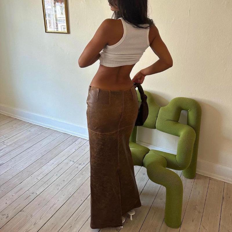 

2024 Осень Женская европейская и американская юбка из искусственной кожи с узким разрезом Large темно-коричневого