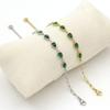 Elegant Gold-Plated Stainless Steel French Bracelet with Green Zirconia