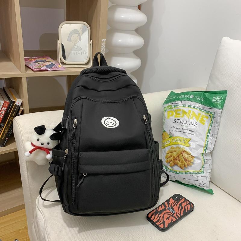 Schoolbag student schoolbag smiley face printing contrasting color large-capacity backpack Korean version Chinese college students commuting 