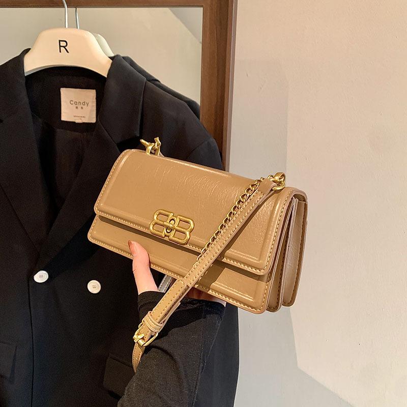 

Популярна цього року жіноча сумка 2024 року, нова сумка під пахвами в іноземному стилі, висококласна ніша на одне плече, універсальна сумка на ланцюжку хакі