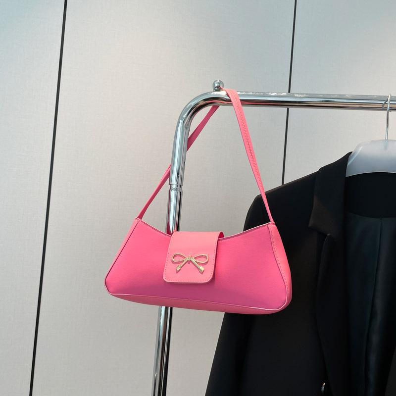 

Popular niche bow bag women s 2025 winter new versatile handbag textured baguette bag shoulder armpit bag розовый