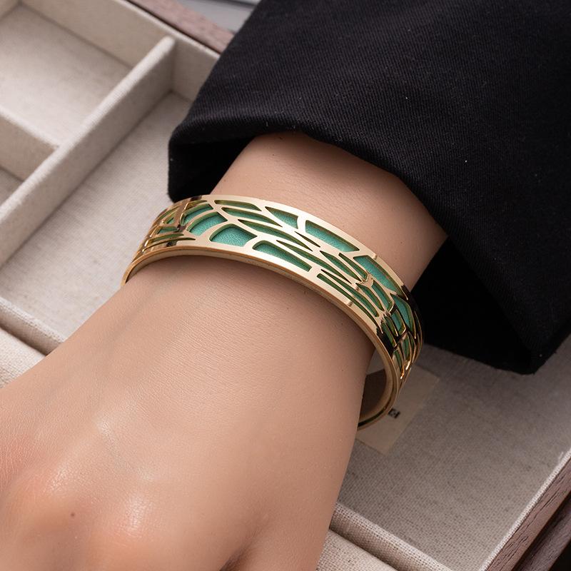 Fashion double-sided color pu leather wide bracelet women's hollow pattern titanium steel open bracelet
