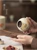 Ceramic Wood Ash Tea Caddy: Moisture-Proof, Fresh-Keeping Storage Jar for Goldfish Design