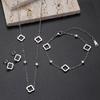 18K Gold Four-Leaf Clover Jewelry Set: Necklace, Bracelet, and Earrings in Titanium Steel with Zirconia.