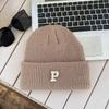 Hat winter female high-value round face student versatile cold-proof warm face small knitted wool hat