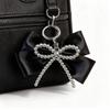 Multi Functional Silver Bowknot Pendant Keychain Gift for Birthdays Holidays Featuring Retro Fusions Accessory