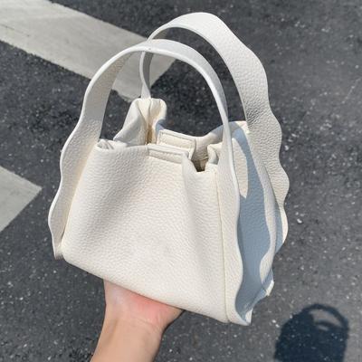 Trendige Hand-Bucket-Bag, neue Frühjahrs-Nischenmode-Schultertasche, hochwertige Umhängetasche