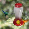 Comedero de plástico con gancho de hierro para flores para jardín al aire libre con forma de botella para colibríes