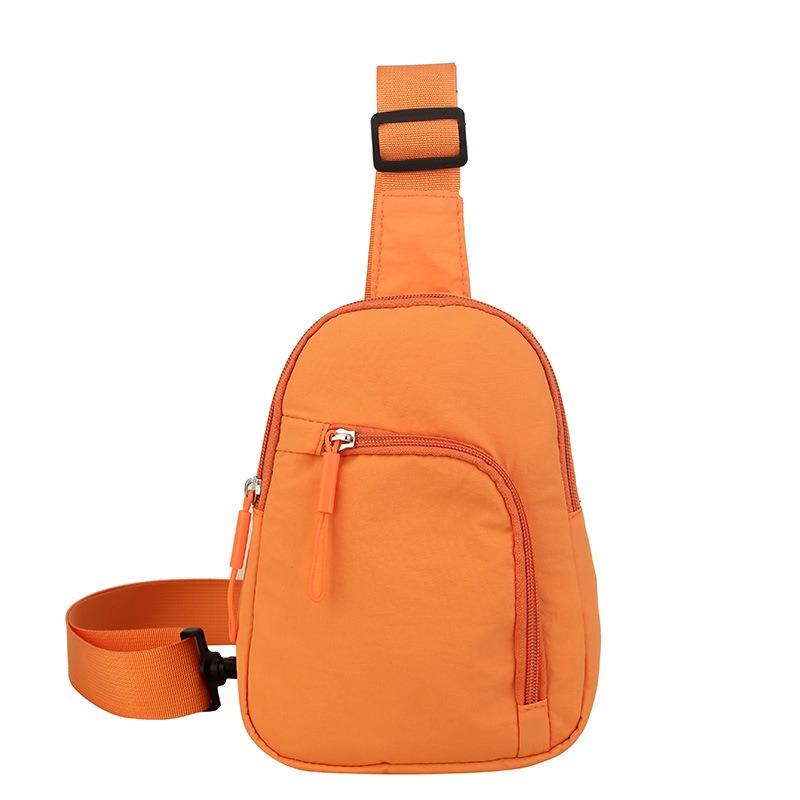 Solid color light and simple going out portable casual mobile phone bag sports shoulder messenger bag breast bag men and women