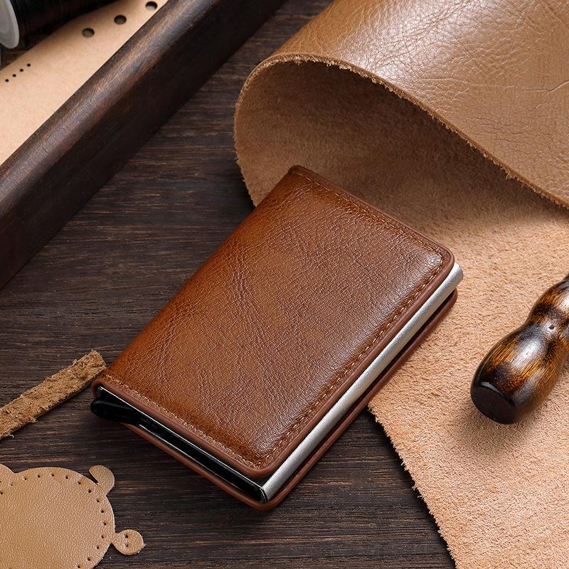 

Металлический автоматический держатель для карт с выдвижным механизмом: Антимагнитная манжета для мужчин и женщин