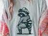 Funny Raccoon Shirt — Cowboy Raccoon Comfort Colors Tee, Trash Panda Western Graphic Shirt, Feral Raccoon Gift for Her