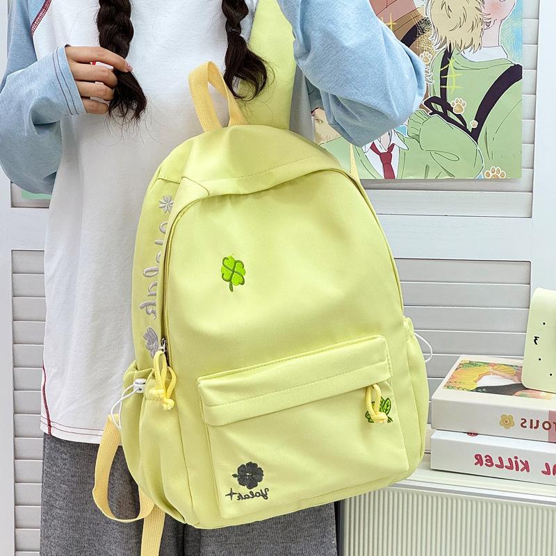 Schoolbag Schoolbag New College Students Junior High School Students Backpack Simple Four-leaf Clover Versatile Large Capacity Campus Backpack