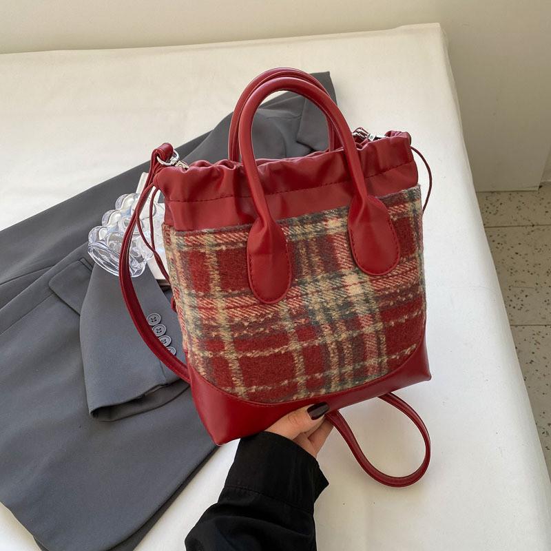 2023 Neue Koreanische Farbblock-Freizeit-Tasche Vintage-Mode Woll-Eimer-Tasche Grenzüberschreitender Trend-Stil