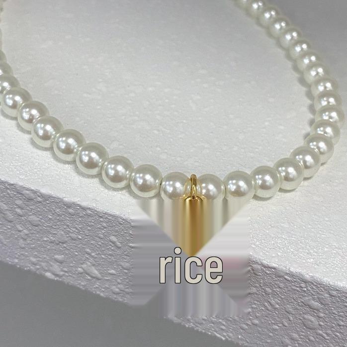 

Korean Minimalist Daisy Faux Pearl Necklace with French Retro Flower Pendant for Women