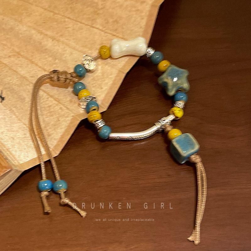 

Niche Style Weave Vintage Design Carrying Strap Peace Buckle Blue Ceramic Starfish Bracelet