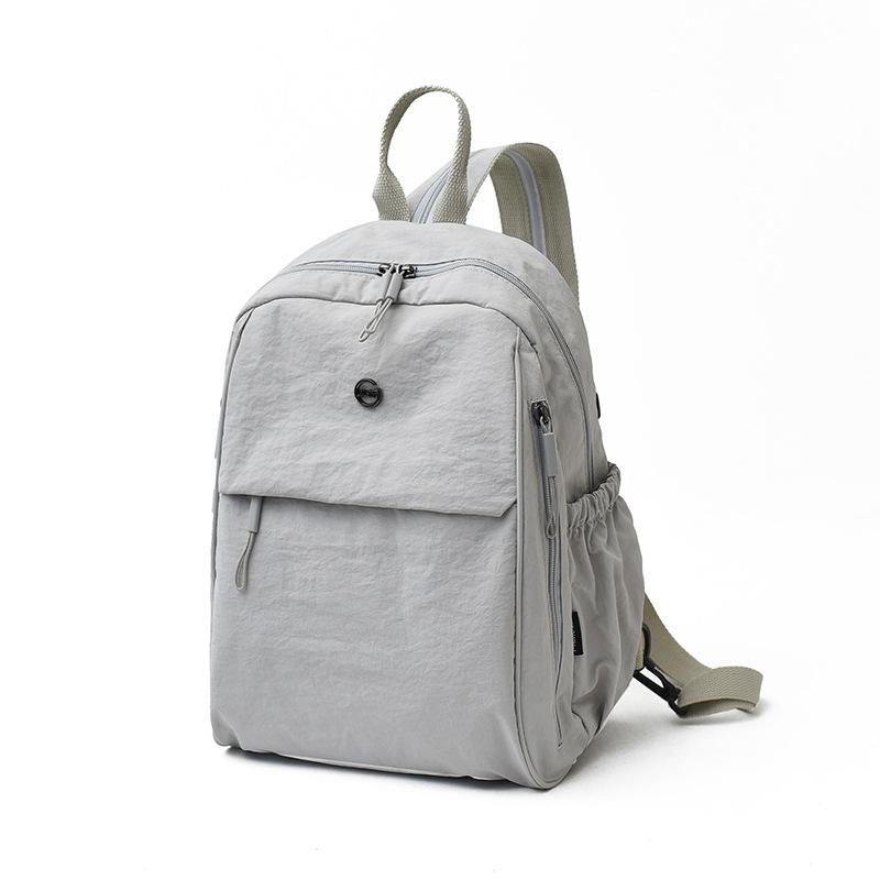 Schoolbag Large Capacity Backpack Women's New Lightweight Nylon Multifunctional Breast Bag Men's Trend Versatile Casual Backpack