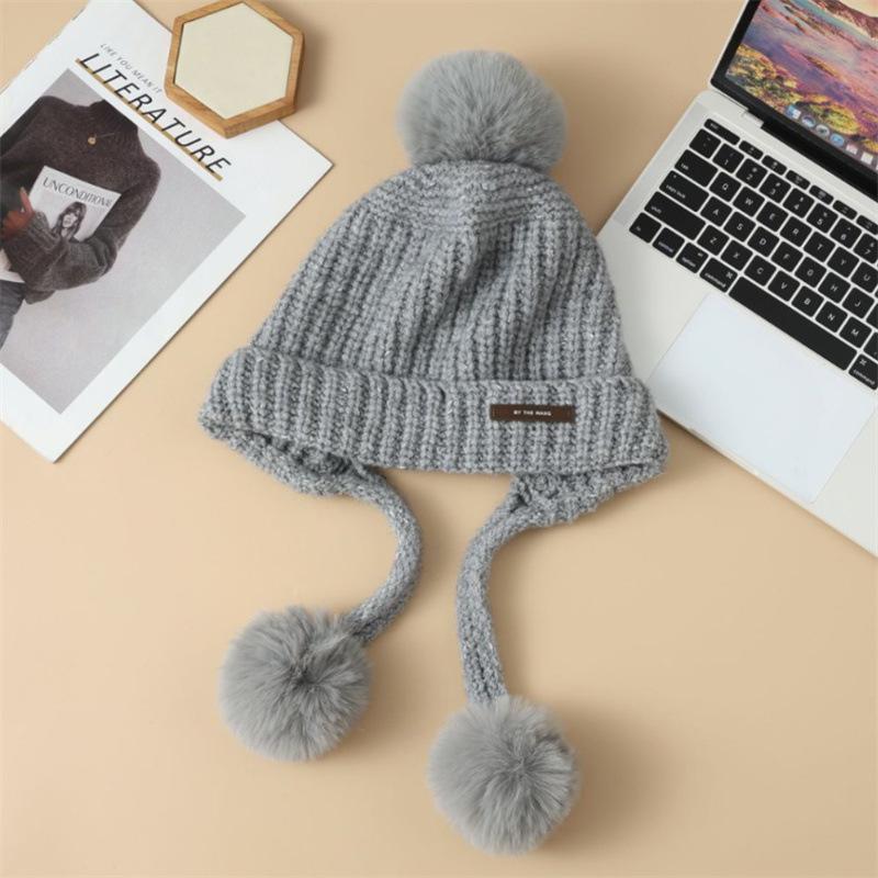 Beanie Hat with Earflap, Stretchy Acrylic Fabric, Adjustable Cap, and Storage Pocket, Hand Wash or Dry Clean