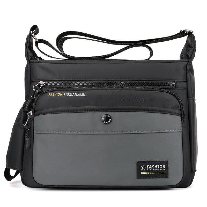

Trendy and fashionable men s messenger bag Large capacity travel bag Daily commuter bag Men s messenger bag серый