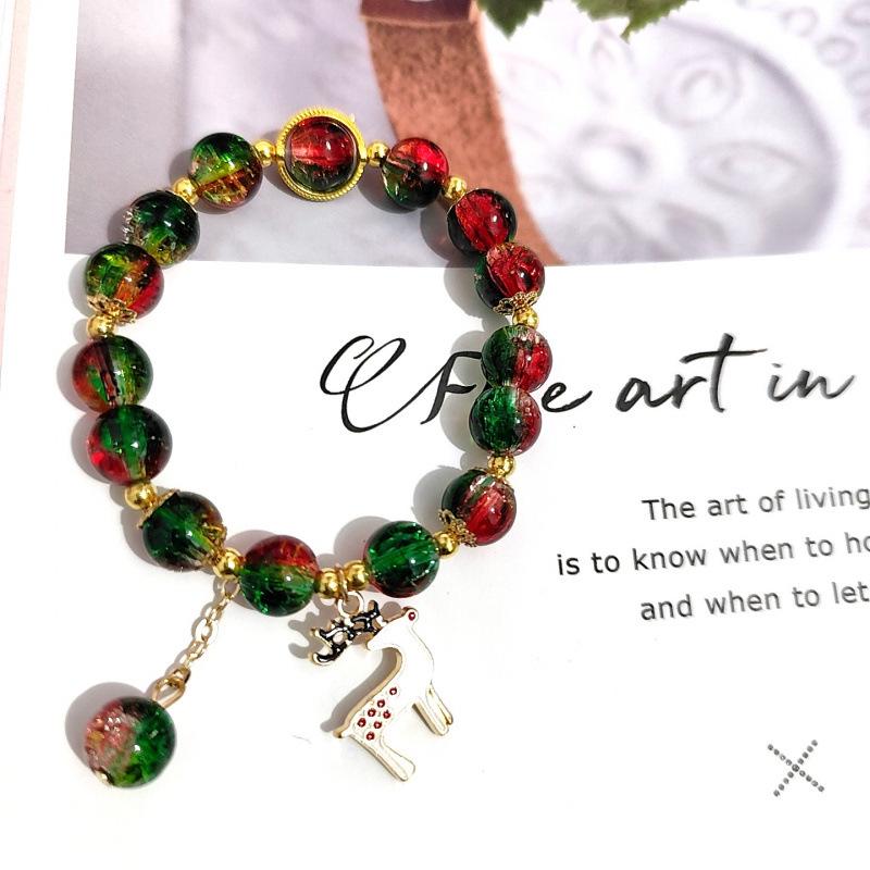 Temu Weihnachtsarmband mit Knisterperlen und Schneeflocken-, Baum-, Weihnachtsmann-, Glockenanhängern