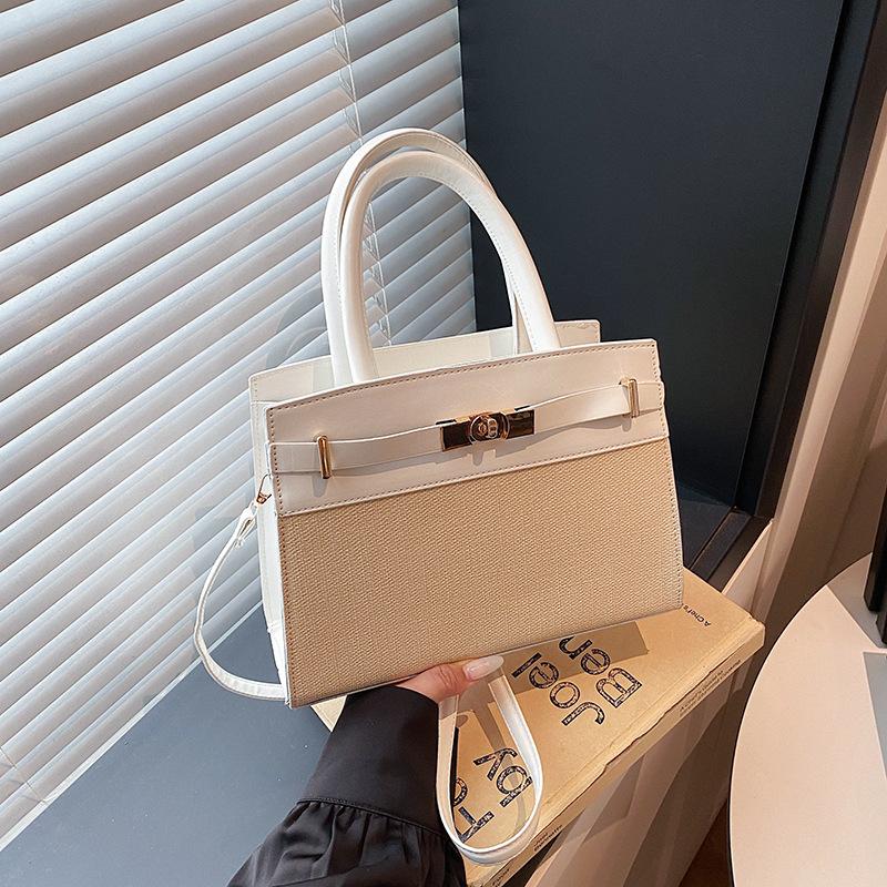 New women's contrasting color handbag bag fashionable high-quality texture shoulder messenger commuter small square bag