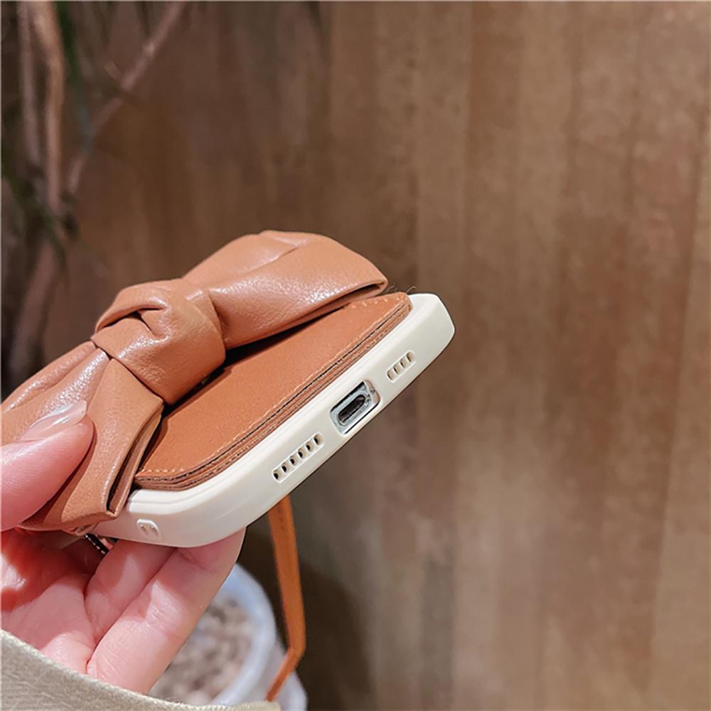 Custodia per telefono con cordino in pelle Pu con fiocco carino 3D per Iphone 11 12 13 Pro Xs Max X Xr 7 8 Plus Cover posteriore morbida e di lusso