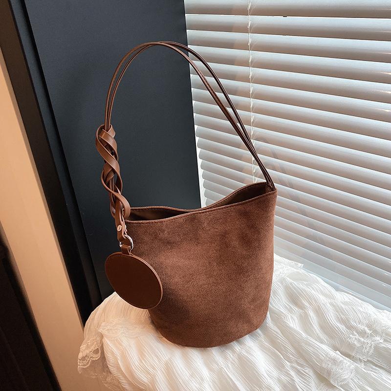 Mode neue Bucket Bag Damen Nische vielseitige Umhängetasche Retro Pendler Wildleder Handtasche