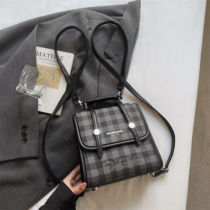 Schoolbag simple foreign style plaid backpack 1011 new fashion trend niche design backpack casual commuter bag