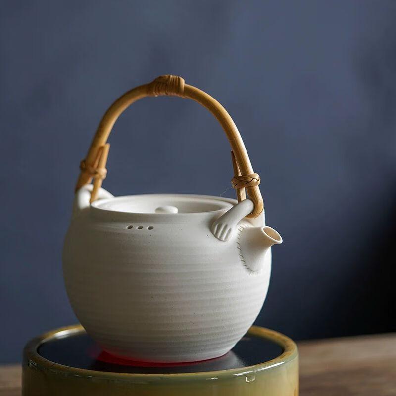 Yixing Purple Clay Rattan Handle Teapot
