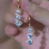Korean-Style Elegant Rhinestone Ball Earrings - Versatile, Fashionable, and Ultra-Shiny Design.
