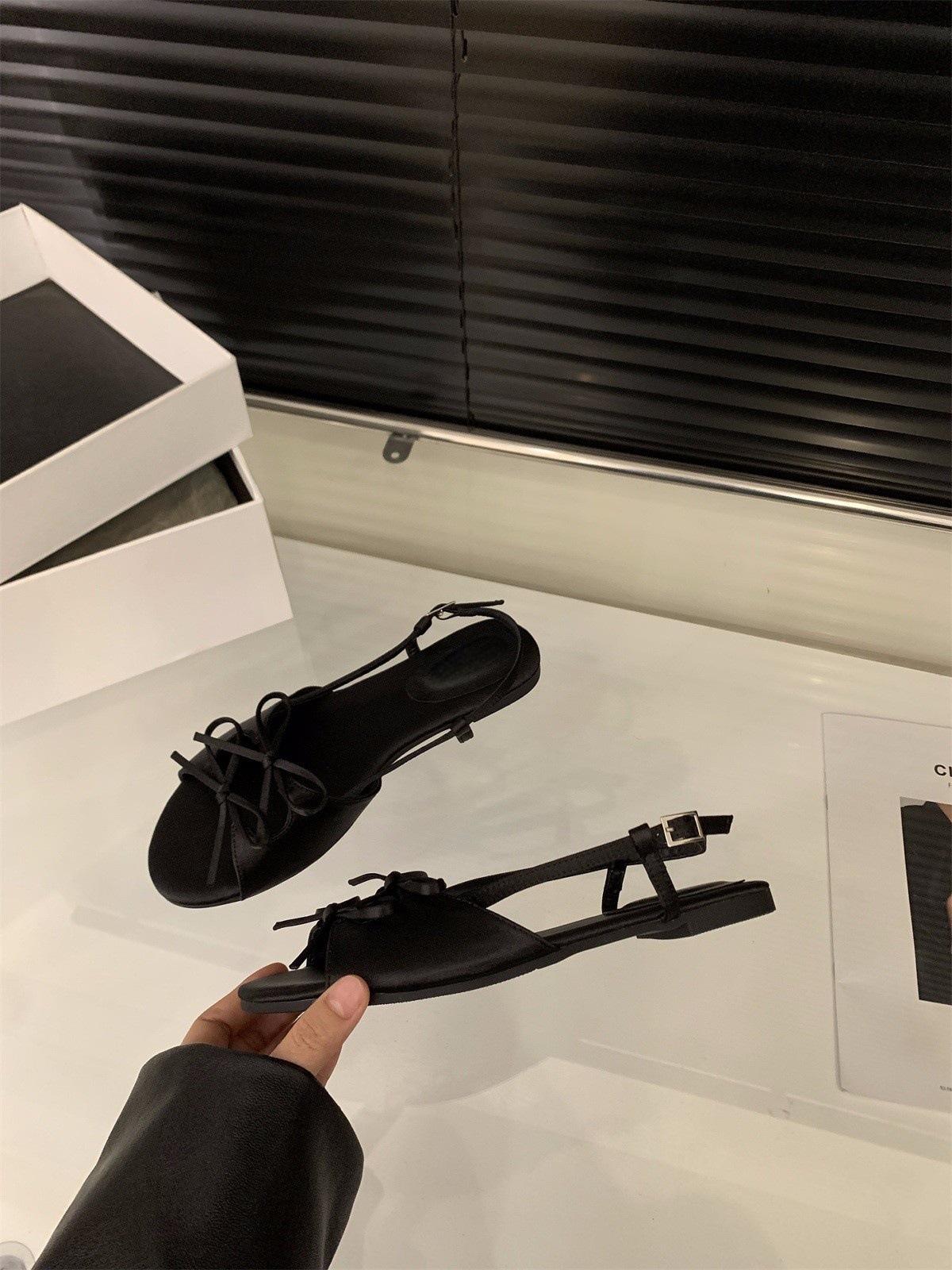 

Niche French bow sandals fairy shoes 2025 summer with skirt temperament vacation satin roman shoes 35 чёрный