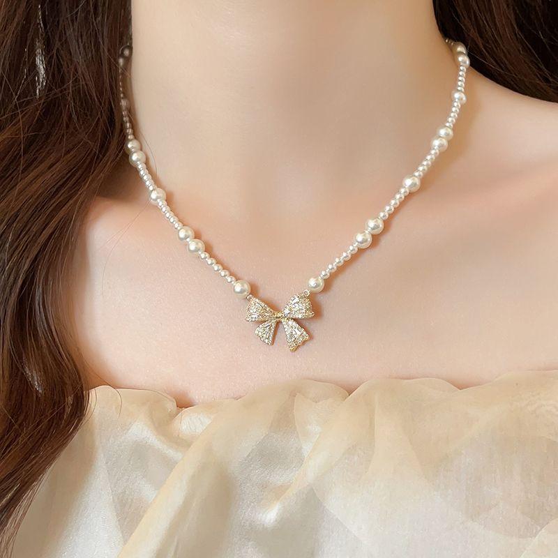

Asymmetrical Cross Exaggerated Pearl Necklace for Women Fancy Light Luxury Minority Unique Clavicle Chain 2025 New Accessories Bows pearl necklace
