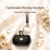 PU Leather Bracelet Coin Purse Keychain: Cute Mini Bag for Earphones & Data Cables