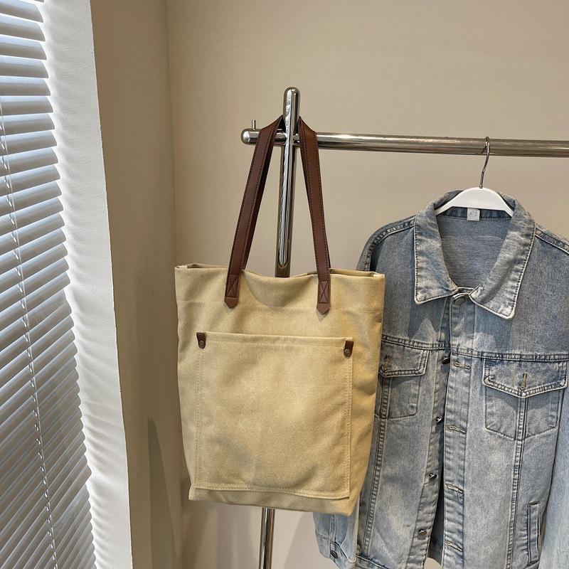 Niche retro canvas bag women's new large-capacity casual shoulder bag class commuter tote bag