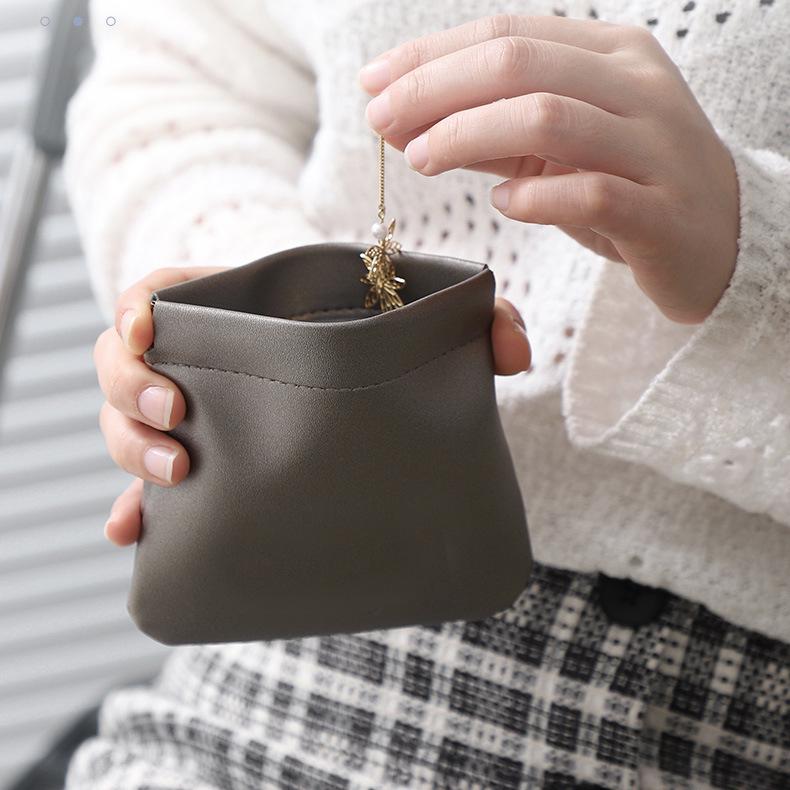 Compact PU Multipurpose Pouch: Lipstick, Coins, Jewelry, Earphones Storage.