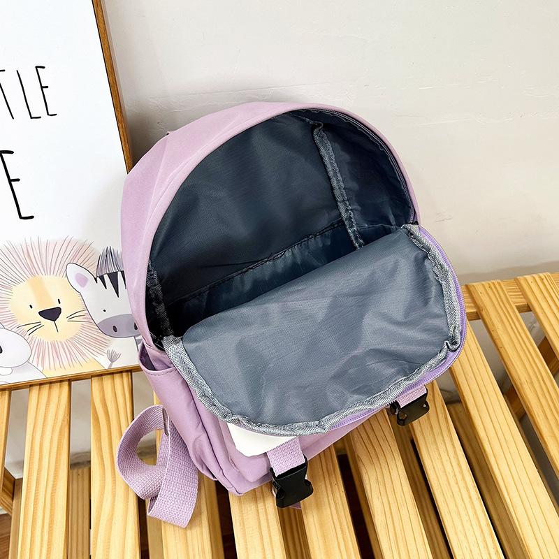 2025 Spring Festival new cute junior high school students versatile contrasting backpack simple small fresh casual large capacity backpack