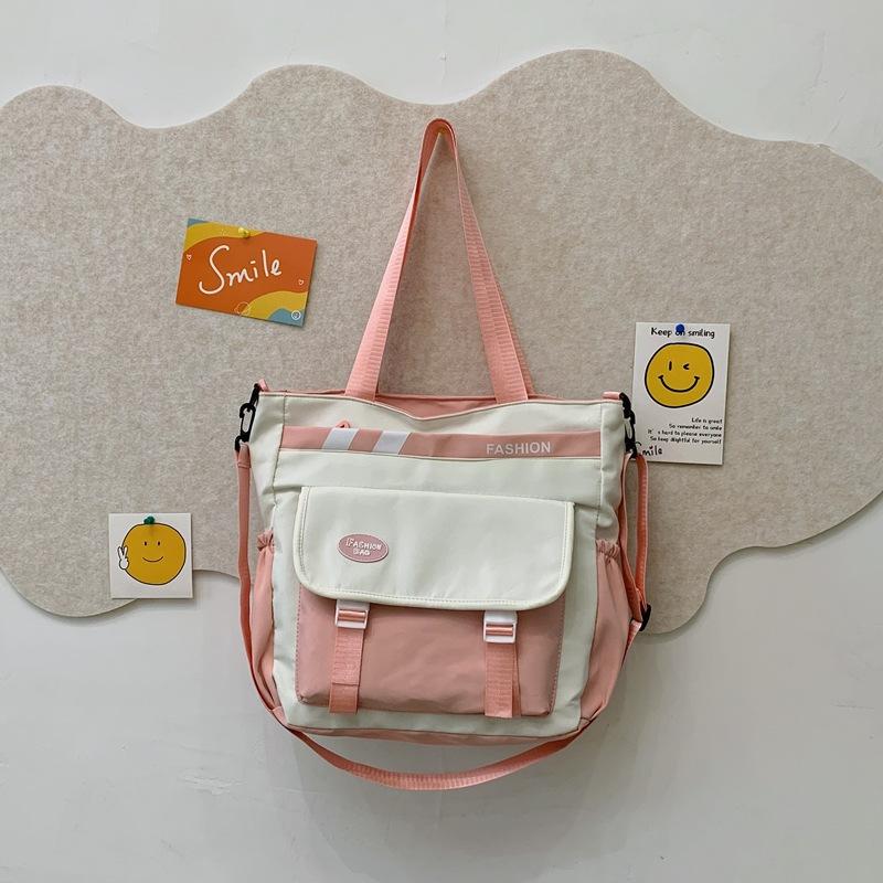 Student contrasting color tutoring bag handbag Children s shoulder oblique span tutoring bag Tutoring class school bag Large capacity розовый