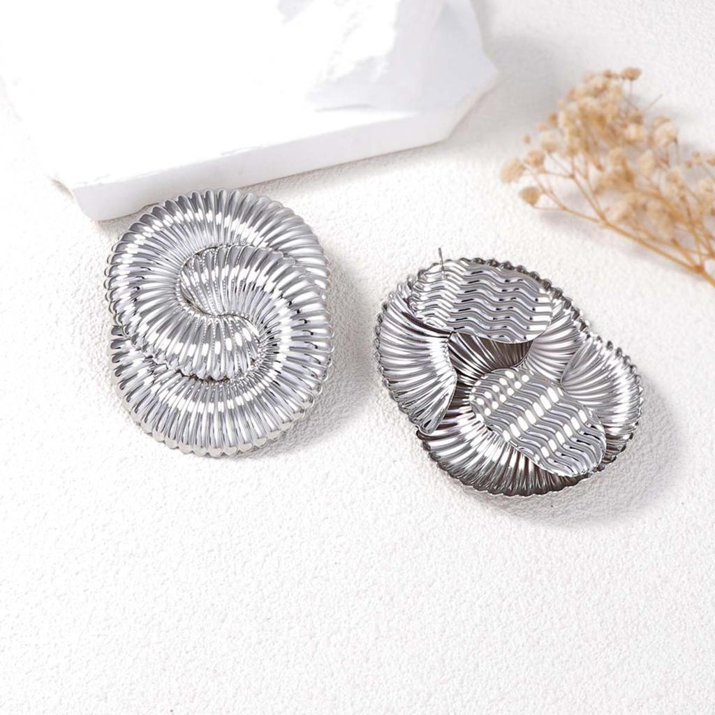 Exaggerated and powerful metal twisted spring wavy stud earrings for ladies, versatile and trendy street style for women