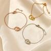 New simple stainless steel gold-plated round interlocking bracelet Korean version hollow beating texture bracelet women's tide