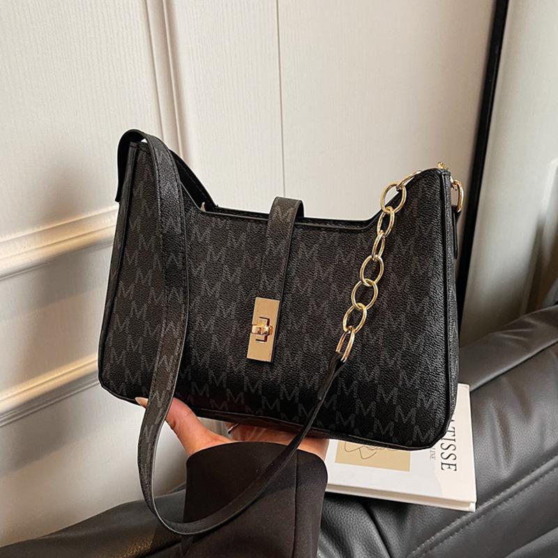 

Корейская нишевая дизайнерская сумка женская 2025 новая высококачественная текстура портативная сумка под мышкой универсальная модная сумка через плечо чёрный