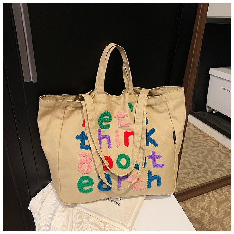 

New high-value large-capacity commuter tote bag women s color letter trendy shoulder bag versatile underarm bag хаки