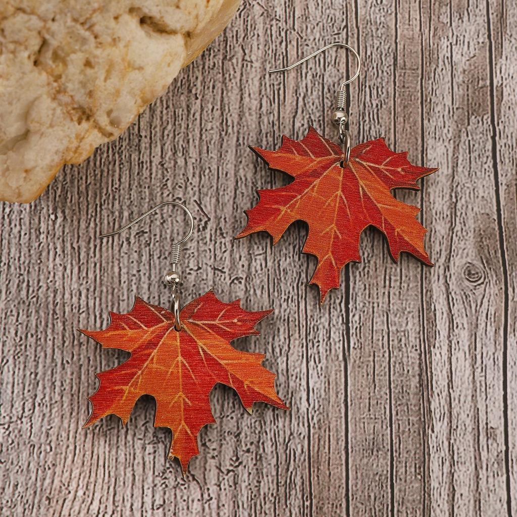 2026 Retro Red Zircon Maple Leaf Stud Earrings – Light Luxury Fashion Jewelry for Women