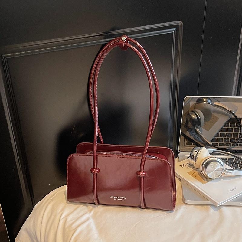 

2025 осень нишевая сумка подмышку высокой ценности женская ретро из масляной вощеной кожи портативная простая плечевая сумка-мессенджер тоут