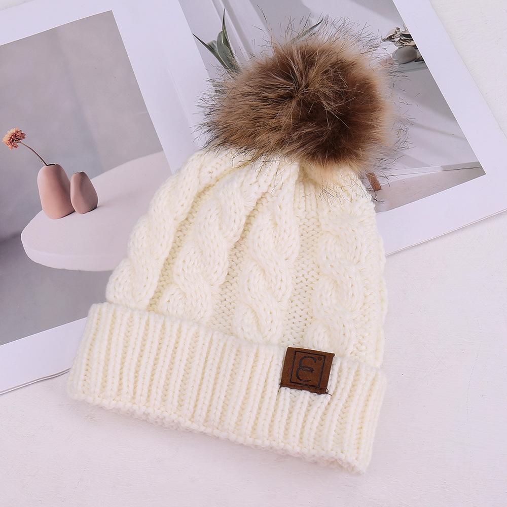 European and American fashion solid color simple warm comfortable knitted hat hairball decoration windproof face small wool hat