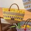 2023 Handmade Woven Straw Bucket Bag: Cute Picnic Basket with Tassel and Wood Bead Decoration
